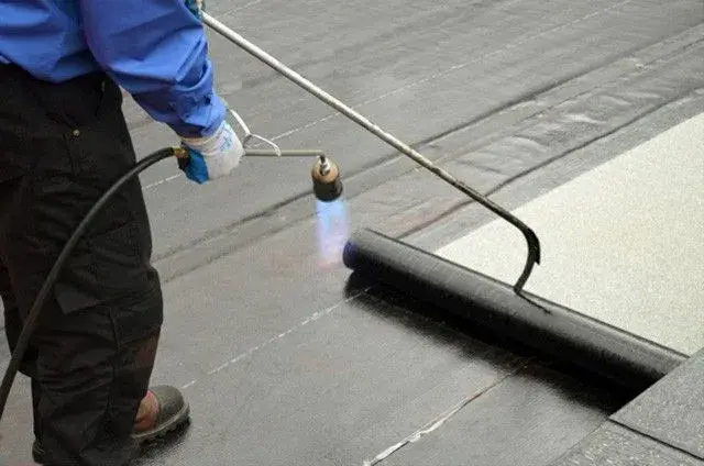 Asbestos roof encapsulation
